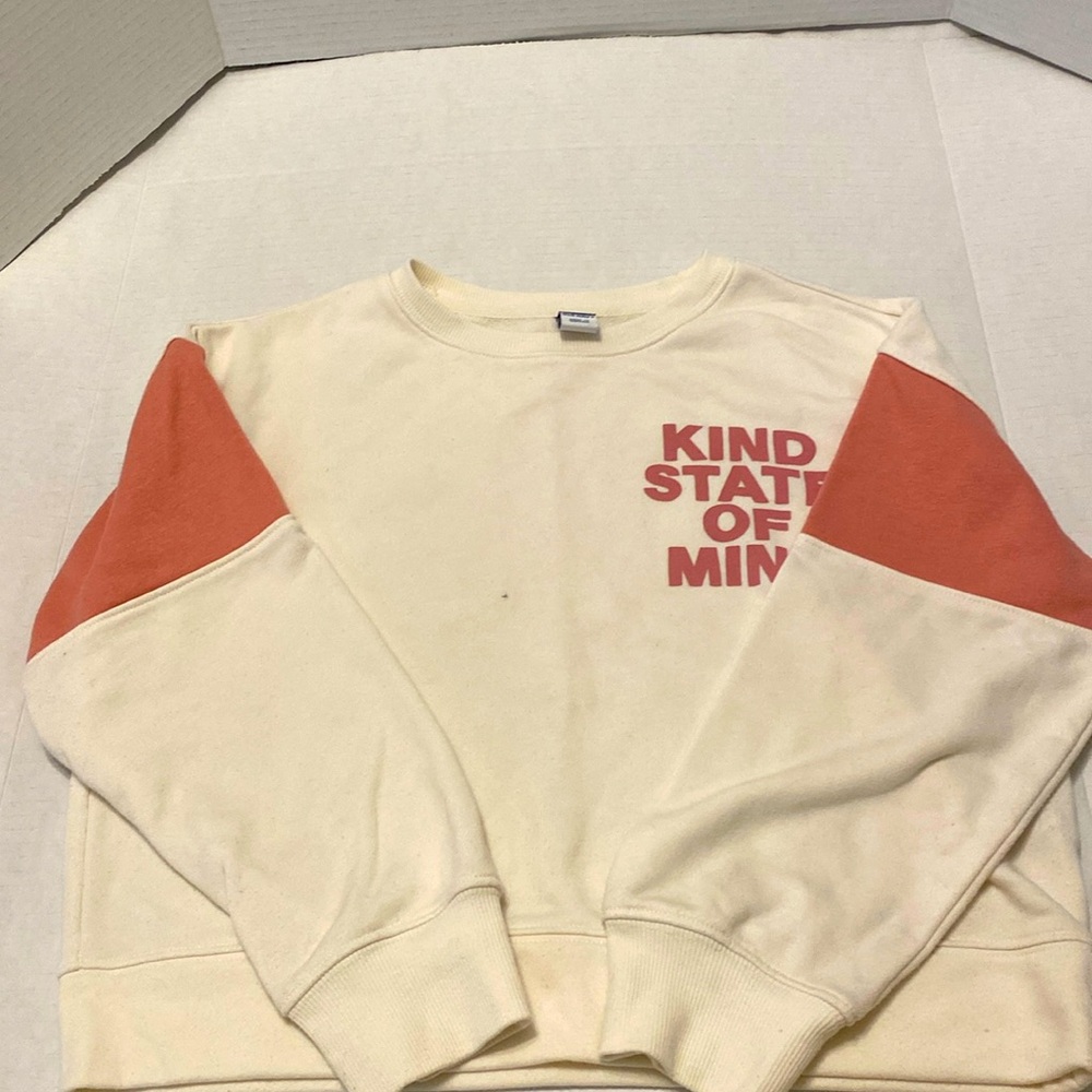 A old navy kind of state sweater with one little stain that you can barely see